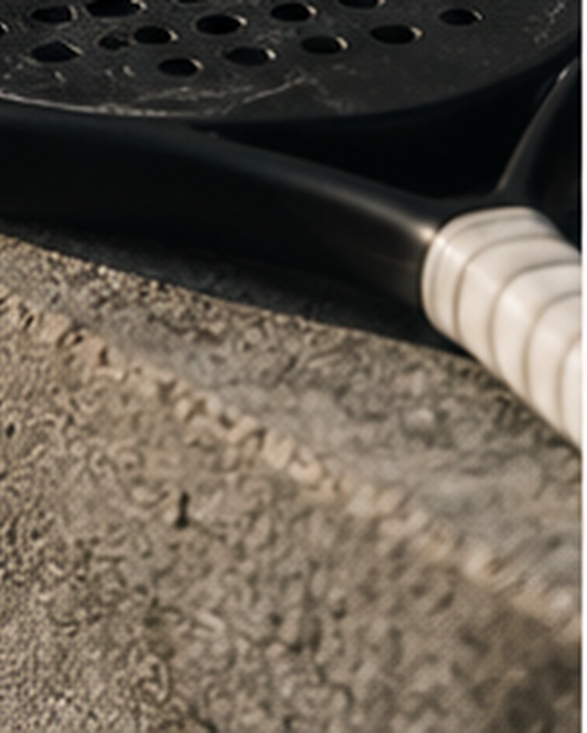 Temporary racket gallery image — racket handle detail